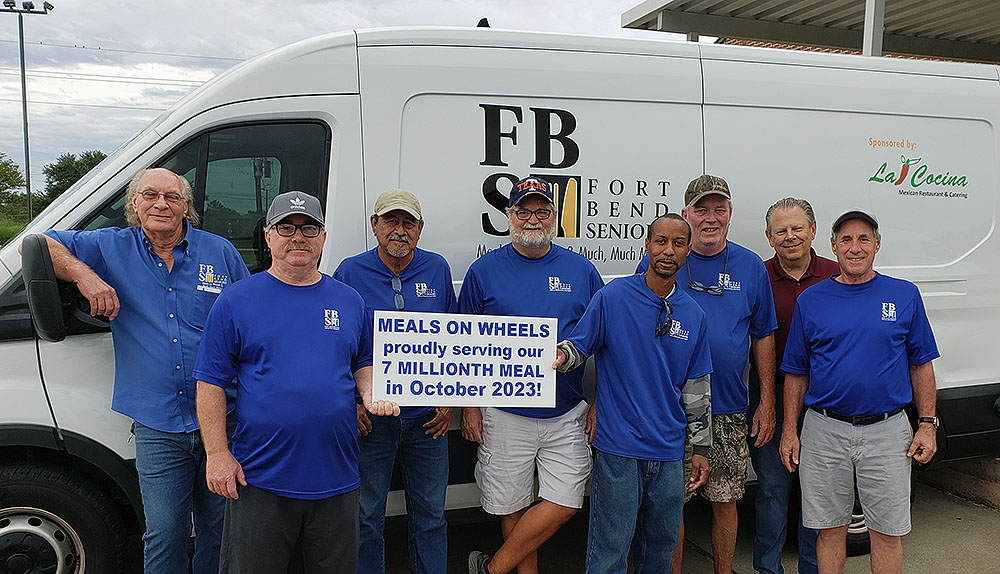 Meals on Wheels group with delivery van